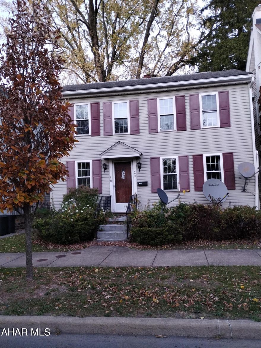 Boro Of Hollidaysburg .. 2 Story  1st flr bedroom, bath, kitchen, living room and dining area . 2nd flr 2 bedroom and a bathroom. laundry hook ups in basement. Good mechanics, newer roof and windows. Off street parking, a flat yard and screened in back porch  .. Set up a showing today