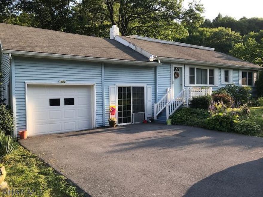 HOLLIDAYSBURGH SCHOOLS! Longer Elementary - Priced to Sell! Off Sugar Run or Oak Ave. Sweet 2 bed main level Rancher with 1 loft bedroom addition on dead end low traffic street in great rural, but convenient neighborhood.  One acre lot with mature oak trees has potential lumber value. Very private shaded back yard with deck, shed and breezeway and dense wooded area and small stream at rear of lawn. Garage and breezeway have high ceilings - potential for 2 car garage with higher doors. Hardwood floors, newer thermopane windows and kitchen cabinets, high efficiency furnace with central air and air cleaner. All appliances stay.  Add your personal touch. Room to add on. Sump pumps do not work; have not been used since French drains; dry basement.  Do not wait to see this CALL TODAY!