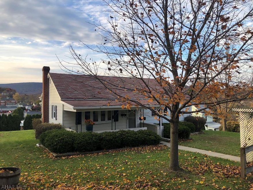 This 2 bedroom, 1 story home sits on a private street and is within walking distance of the Penn State Altoona campus. Enjoy the mountain views from the rear porch over looking the 130 x 120 corner lot. There is a detached 1 car garage and a separate workshop shed. The interior has a nice sized living room and eat-in kitchen with appliances, newer vinyl windows and newer furnace, plus central AC. The main bedroom has a large closet and hardwood floor. The additional bedroom has carpet but appears to be hardwood under all the carpet. The large walk-out basement has the potential for additional living space. Great home, great location.