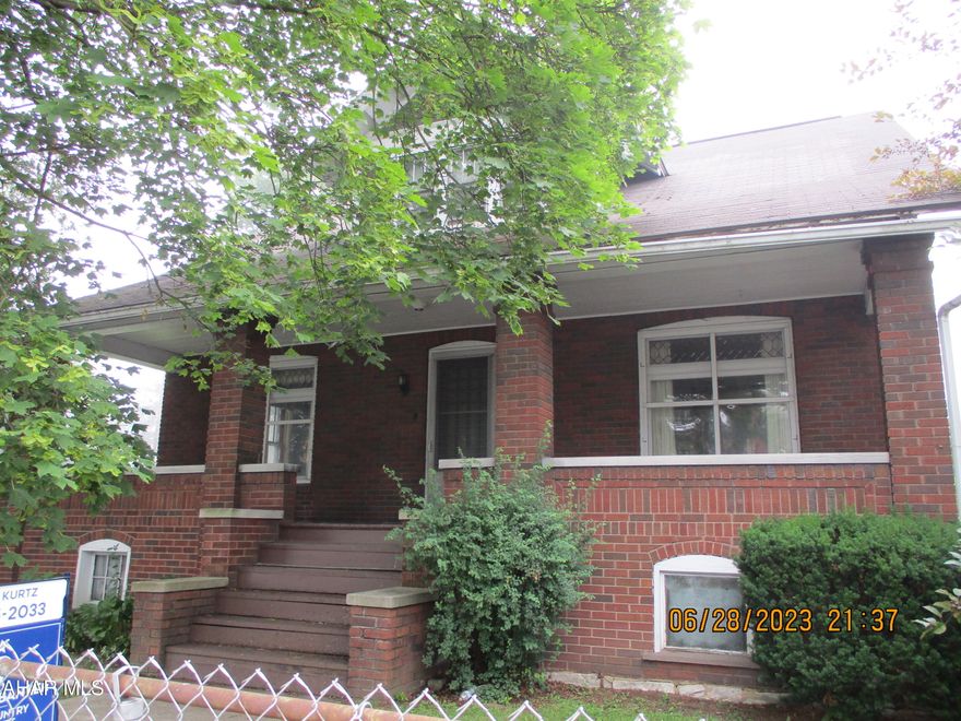 Stately brick on fenced corner lot in Eldorado.  Features eat-in kitchen, formal dining room, 1 bedroom on first floor, 3 bedrooms on second floor, enclosed rear porch, electric fireplace, and easy access to many amenities.   Roof is reported to be 10 years old, sanitary lines redone in 2008, hot water boiler replaced 2008.  Sellers will make no repairs.