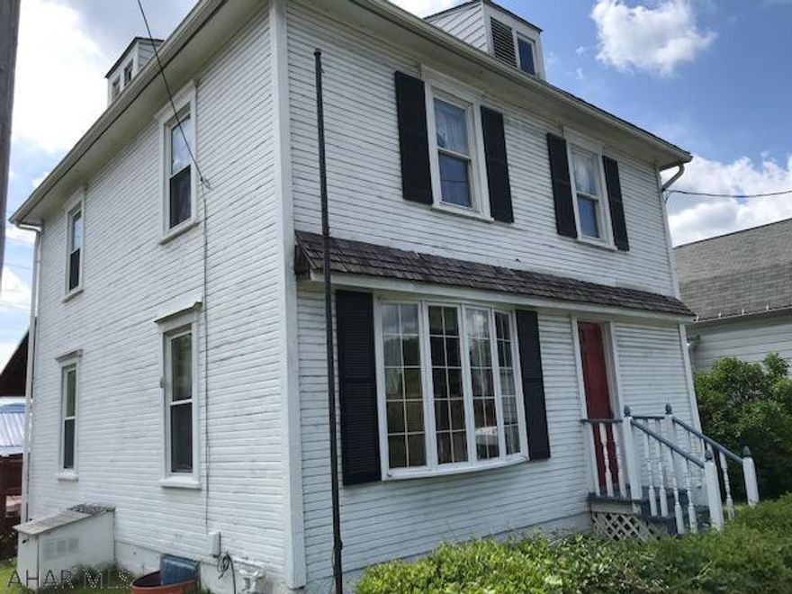 Lots of house for the money!  First floor bathroom and laundry area.  Large sunroom has window AC unit.  Interior is alittle tired and needs brought back to life!  One car garage has workshop area in the back and attached carport.  Two nice sized sheds.  Dead end street.  Convenient to shopping and I99.