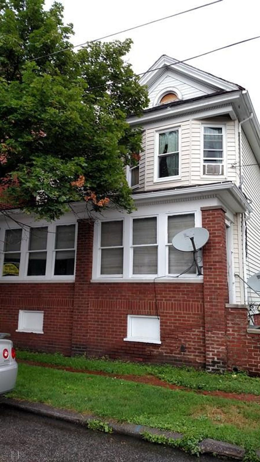 Investors- conveniently located 2 unit house with an additional 1 story house included. Two units are rented, 1 vacant. Seperate water and electric. Garage could be torn down for additional parking.
