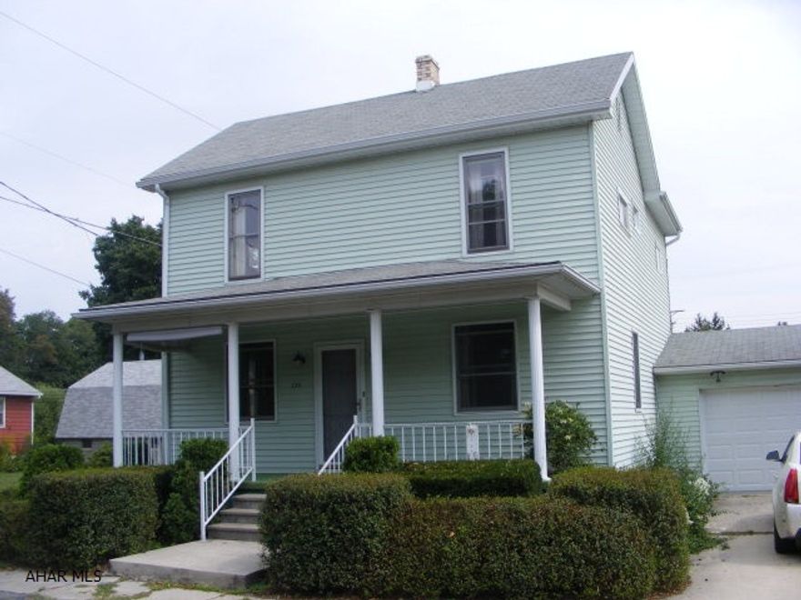 Two story vinyl sided home with Living Room, Dining Room, eat in kitchen, bath and laundry room on the first floor. 3 bedrooms and bath on second floor. Newer roof and hot water baseboard heat.