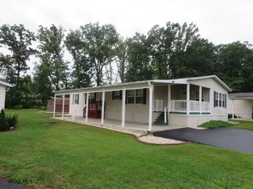 Very nice doublewide in popular Friendship Village. Three bedroom, two full baths, all appliances included. Kitchen has breakfast bar and lots of storage space. Large master bedroom includes walk-in closet and master bath with double sink and a garden tub. Laundry room with washer and dryer. Exterior is nicely landscaped and features a car port and a storage shed. Definitely move in ready!