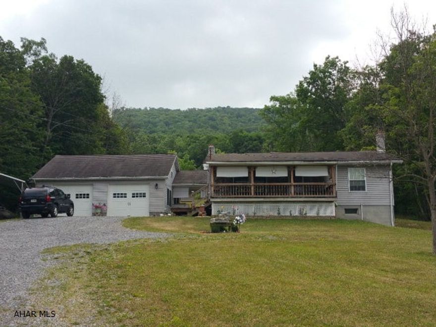 Very nice 2 bedroom rancher with newly remodeled kitchen on 3.4 acres. Family room. 2 car detached garage. Separate 2 story workshop. Above ground pool.