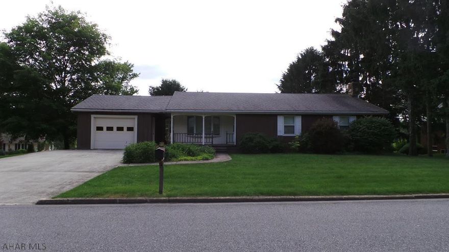 Spacious and roomy inside needs some updating, but great space.  Master Bedroom with 3/4 Bath, FR with skylight.  Nice yard with driveway in rear for an RV.  Large basement - partially finished & pellet stove.