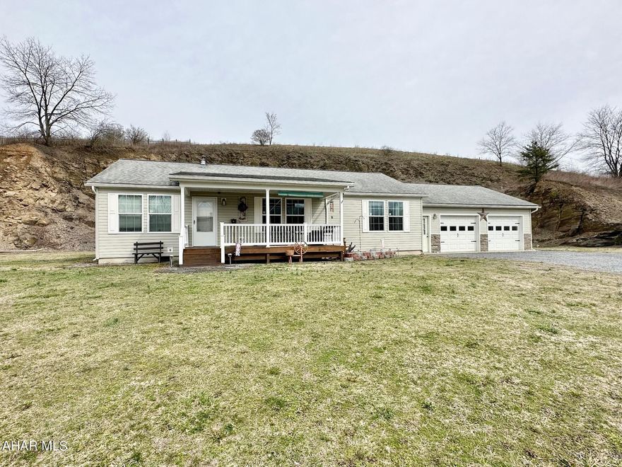 Garage goals? You just found them! This 3-bed, 2-bath ranch on 1.66 acres blends comfort and utility with an eat-in kitchen featuring hickory cabinets, a spacious living room with a gas fireplace, and a 2-car attached garage. But the real showstopper? A massive 40' x 60' commercial garage with 14' overhead doors—perfect for hobbyists, contractors, car collectors, or anyone who needs serious shop space. Whether you're wrenching, working, or just need room to roam, this home delivers.