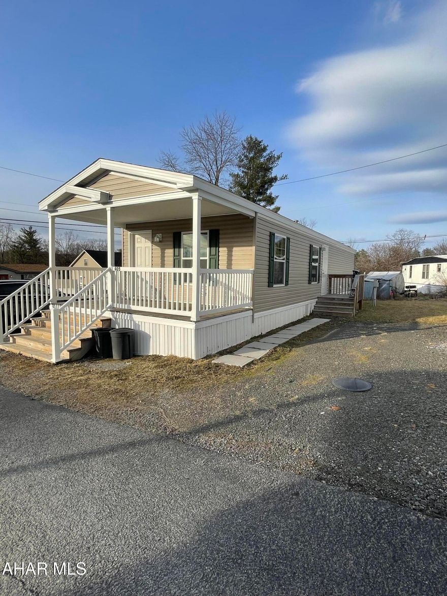 This well-maintained 3-year-old single wide trailer with central air is move in ready and located on a rented lot with a monthly lot rent of $425.00, which includes trash removal and road maintenance.