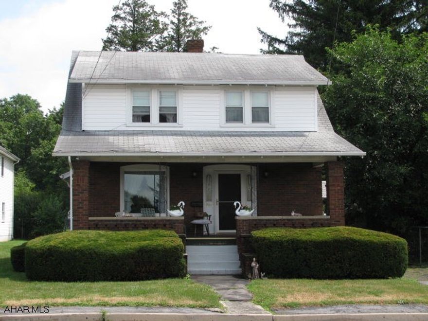 Charming brick and vinyl home on large lot w/carport & shed, Beautiful eat in kitchen w/oak cabinets & ceramic tile floor, LR., DR.,3 BR.,& full bath w/new flooring, covered back porch, thermopane windows recently updated gas hot air furnace & water heater. All that is left for you to do is move in!