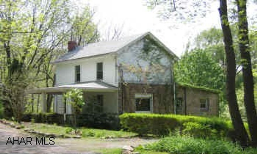 2 Story, old farmhouse on approx 2.6 acres with some woods