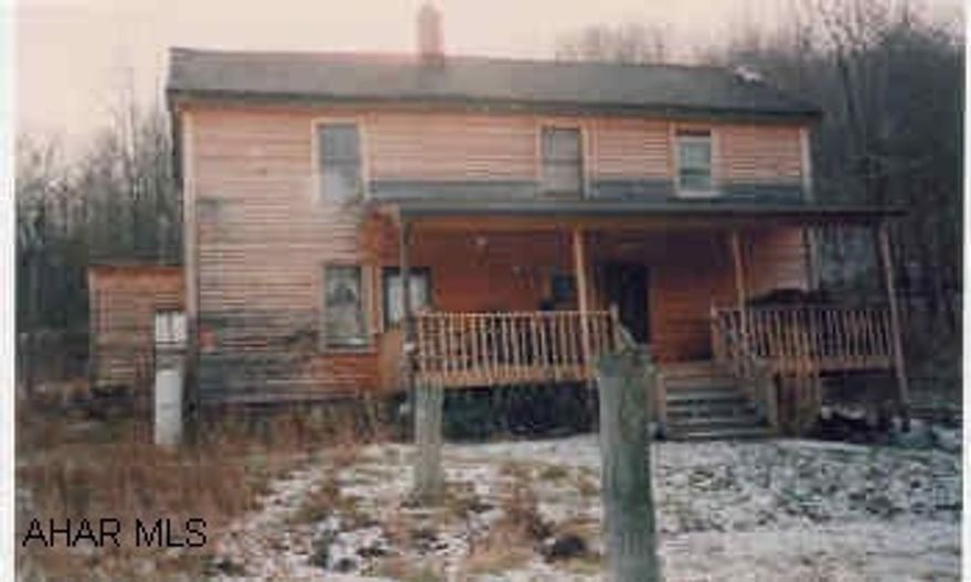 Wood sided 2 story house on acreage