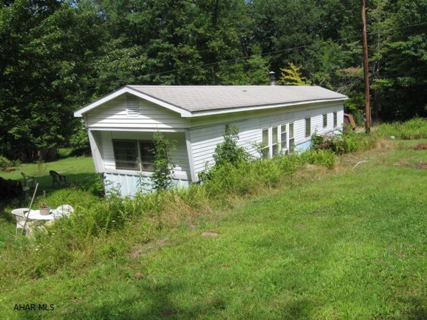 RUAL AREA ADJOINS STATE GAME LANDS 2 AC!  Great for hunting camp or build new home! Well and Septic on lot are both maintained and in working order.  Old trailer on lot can be used as a hunting camp or removed by buyer.  Will not qualify for financing and being sold in AS IS condition.