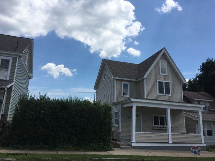 Come on in and pick your paint colors...it's primed and ready for your color preference! This one is a beauty with stunning wood floors and space galore! Home features: NEW drywall, insulation, wiring, furnace, and C/A! 3rd Floor boasts a Master Suite with bath and WIC. Bathrooms are large and bright. 1st Floor includes a bonus room with bathroom that would make a fantastic Master bedroom. Sun Room opens to the large deck and if that wasn't enough there is a HUGE 3 car garage with a Man cave up top, waiting to be finished! All this sits on a double lot in a great convenient location!