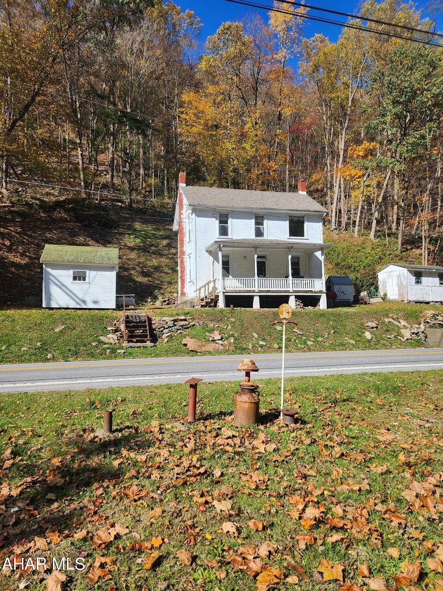 Looking to get away?  Maybe this is the place for you!   This 2 Story frame house has 2 bedrooms, 1 Full Bath, Kitchen, Living Room. Deck on the back of the house for entertaining. Property is on the Juniata River - great outdoor space.  Fishing - Hunting - Kayaking - Canoeing -   Lake Raystown within 15 minutes.  Make this your permanent home or your vacation home.  Plenty to do here.  Weaver Falls Boat Launch is approximately 8 miles away from this property.  Call to set up your appointment today.  You don't want to miss out on this property.
