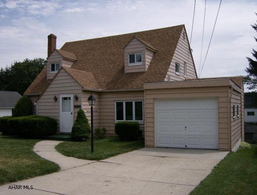 Ebensburg- 4+ BR Cape Cod aluminum sided home with new kitchen, bath, dry-wall, flooring & plumbing. 1 car attached garage and a 1 car detached garage