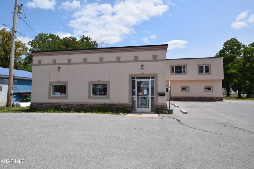 Well appointed and nicely remodeled one story office building with attached two story rental that could be another separate office for rental income or easily made to connect to the main building for additional space.  Main building is currently set up for medical, but could be anything.  Great location and traffic count.