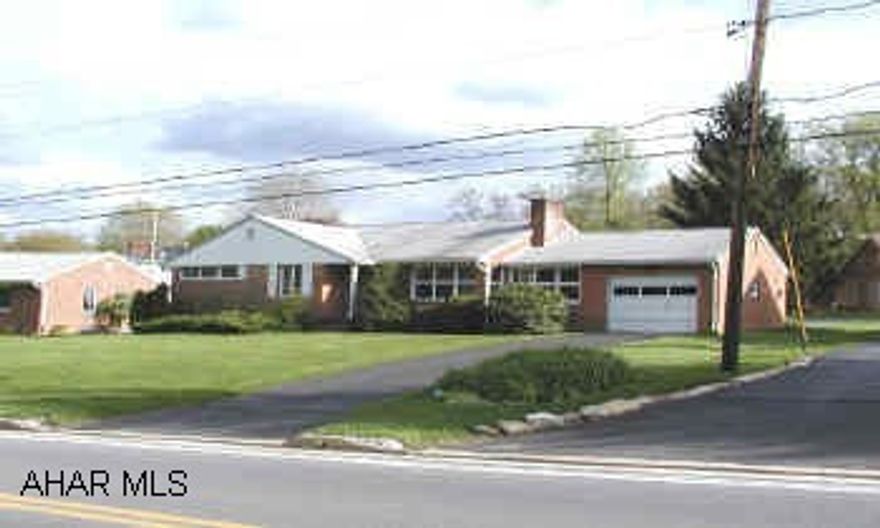 Ranch home with garage, 2 bathrooms, all appliances, fireplace. Brick ranch home with attached garage, breezeway.  Living room with fireplace, dining area, all appliances in kitchen, 3 bedrooms, 2 baths.  Gas HA heat.  Across from Reservior Park.