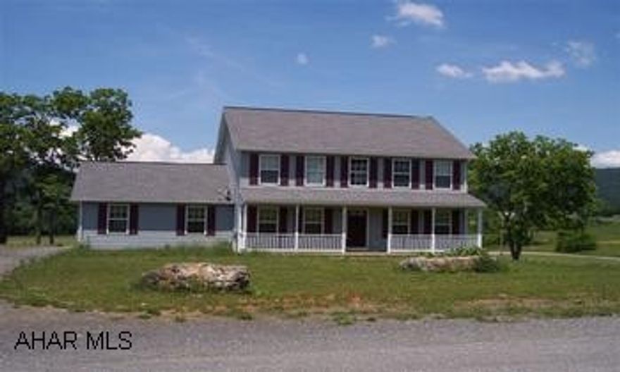 Almost new 2 story vinyl home with attached 2-car garage that boasts 4 bedrooms, 2 1/2 baths, formal living room, dining room, kitchen and gathering room.  Ground level walk-out basement with family room potential.  All this on 1.87 acres in quiet area of development.  (Directions:  Rte. 30 east - right onto Rte. 326 - left into Cove Park Acres - stay to the right - right onto Wild Cherry Lane.)