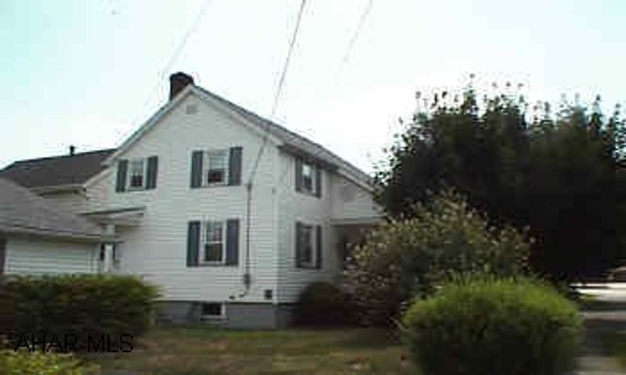 Toy Town beauty.  2BR's, new carpeting, vinyl siding, 2 car garage, large corner lot.
