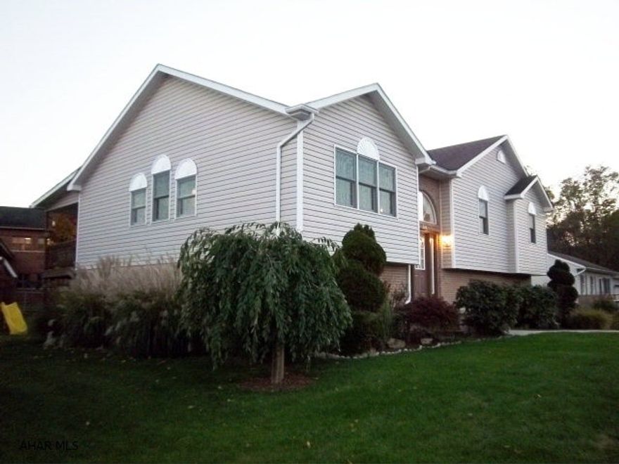 This huge home is move in ready! Open floor plan with new kitchen. All 3 baths are new including MBR with jetted tub. Private deck off the rear of the house, accessed from MBR or dining room. FP in family room, 3 BR, 3 BA, oversized 2 car garage. Storage everywhere you look. Overhead storage in attic with built in shelving. This home will not last. Beautiful landscaping & flat yard.