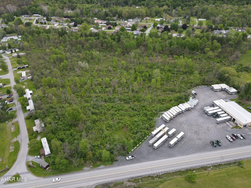 Here is an opportunity to own over 26 acres  of mostly wooded ground that feels extremely private, yet is close to EVERYTHING!  Property borders Old Rte 22 on one side and Windvale Drive on the other.  No utilities currently in place.