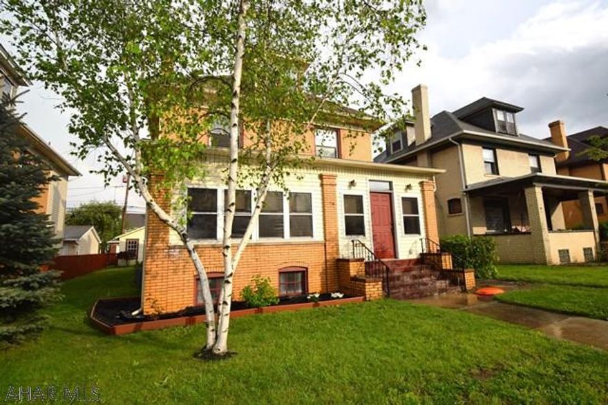 This is my kind of house.  Original woodwork, hardwood floors, stained glass, leaded glass, exposed brick.  So classic!  Large rooms, beautifully remodeled kitchen.  Awesome third floor would make a great master bedroom or teen haven.  Screened rear porch.  Nice block of Broad Ave.  HOME WARRANTY INCLUDED!