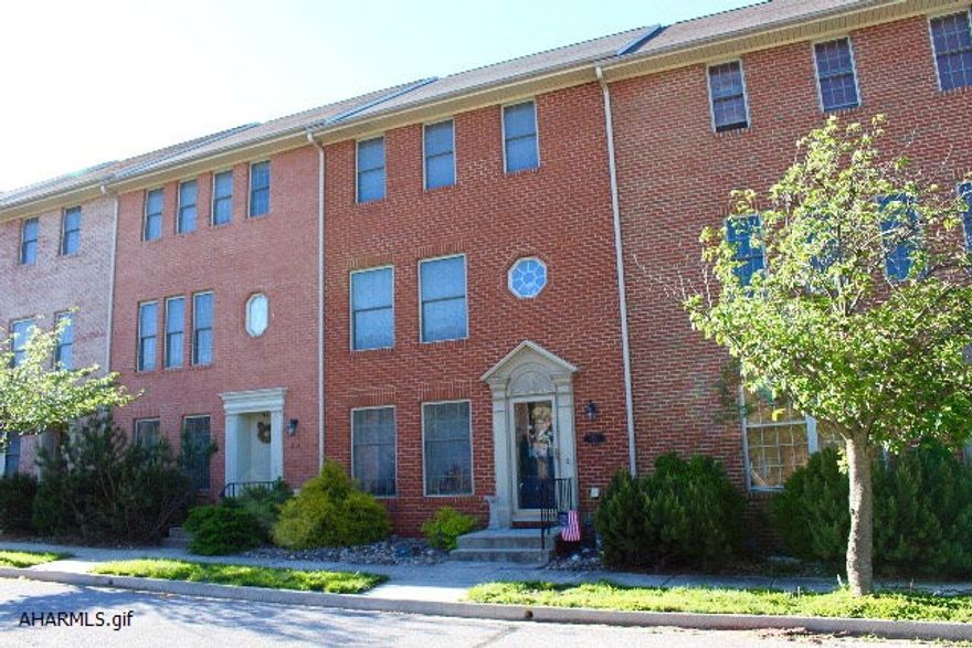 Built in 2002, this 3 story Hollidaysburg townhouse was immaculately kept by its original owners.  A beautifully landscaped patio can be seen from the open concept kitchen, living room and dining room on the second story.  3 large bedrooms (one of which can be used as an additional living area or den and 2.5 baths!  Detached 2 car garage faces a park.  Additional storage in attic and above the garage.  Includes stove, refrigerator, microwave, washer, and dryer!