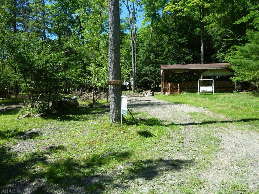 Double flat campsite on Lakeside Circle, near Dutch Run Pond.  Site has a older pavilion that needs some work.  Plenty of room for your camper, boat, shed and parking.  Located in Glendale Yearound, a gated recreational community adjacent to Prince Gallitzin State Park / Glendale Lake.  Six miles from Rock Run ATV Park.
