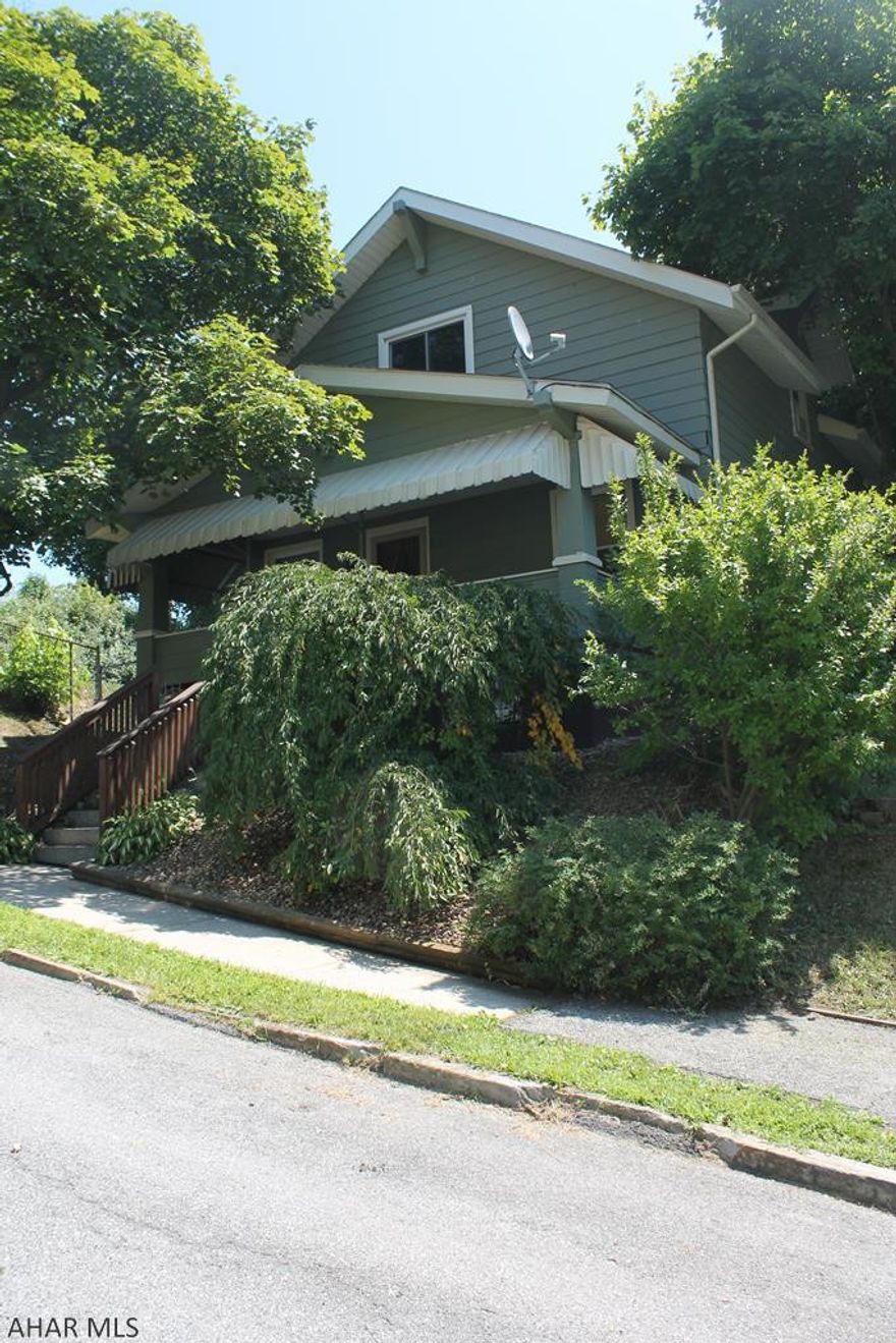 Beautiful 3 bedroom ,1 full bath home, sitting on a double lot with an above ground pool with a large Deck.Walk into this home and make it yours. Home features a first floor master bedroom ..2 Large bedrooms up stairs with 2 bonus rooms as well. Updated Kitchen and many more.. Sit outside on the Large Deck. Or enjoy evenings around the fire pit. This is a must SEE.. Also included is the extra lot   Parcel ID  01.03-05..-068.00-000 size of the extra lot is 61x120.