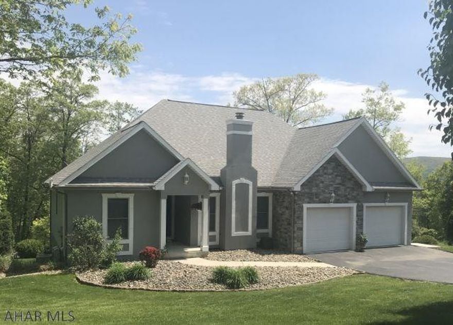 Meticulously maintained 4BR, 3BA Ranch in the Elmwood area of Hollidaysburg. Home has been remodeled with many custom upgrades. Home features vaulted living room ceiling with crystal chandellier & custom gas fireplace, large custom walk-in shower, 1st floor laundry, large ceramic tile throughout except for neutral light color carpet in bedrooms, finished basement, all neutral palate, upperdeck & lower stamped patio on a private picturesque .3 acre lot. Agent owned.