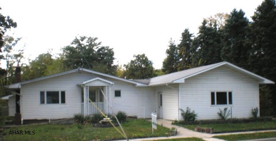 Spacious and very unique 2 Bedroom, 2 Bathroom house with attached/heated 2 car garage and separate 1 car garage/workshop area. Other features; 2 heating systems (hot water and gas forced air),Central Air, Living Room with gas fireplace, Dining Room,hardwood floors,large Sun room with skylights, Bonus Room with Kitchen that has potential for efficiency apartment or  mother in law suite. Spacious basement with workshop, storage space and potential for finishing as a large family room. Rear portion of the property has a huge fenced area for extra parking or entertaining as well as a separate fenced yard and dog run.  Property is being sold as is condition. Current Flood Elevation Certification Available for review.