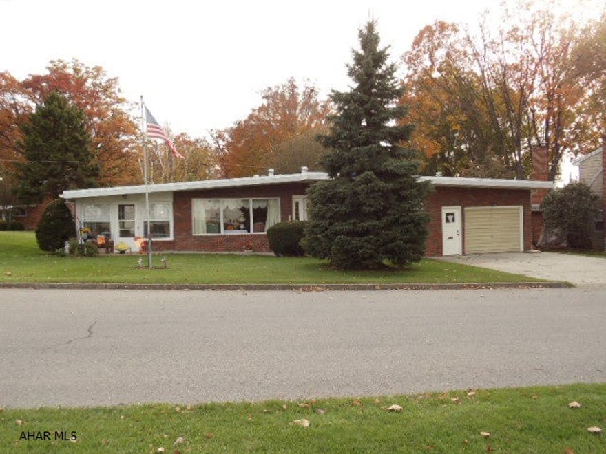 Spacious 1 story brick home, heated sunroom, modern kitchen w/pantry, updated bath w/double bowl sink.New floor covering in kitchen, hallway, bath, & laundry room. Nice backyard, new deck in back,  10 x 20 shed, & 1 car attached garage. #J-100