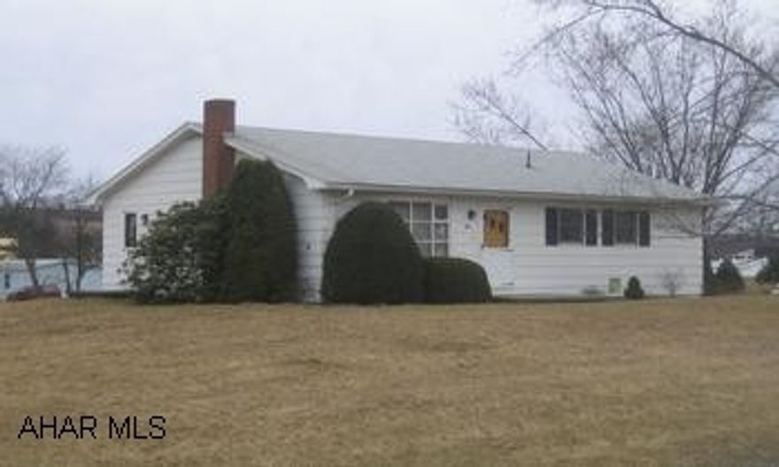 One story home, close to Chestnut Ridge Schools. Mountain view, large yard, established garden, quiet neighborhood, rear entry garage.