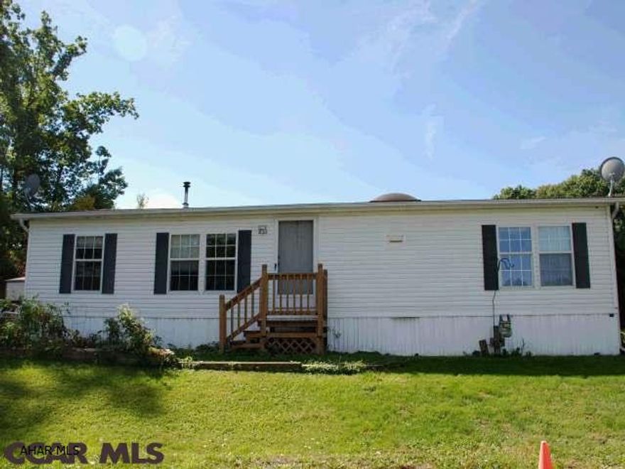 This 1200 SQ FT mobile home is super fresh! New carpets and new floors in kitchen. Sit out in the evenings on the back deck and relax from the long day. This home is 2 min from 322/I99- North Atherton st. This would be perfect for the second pad for visits for the Penn State games. New owners must be approved by rental company once under contract. Lot rent includes basic cable.