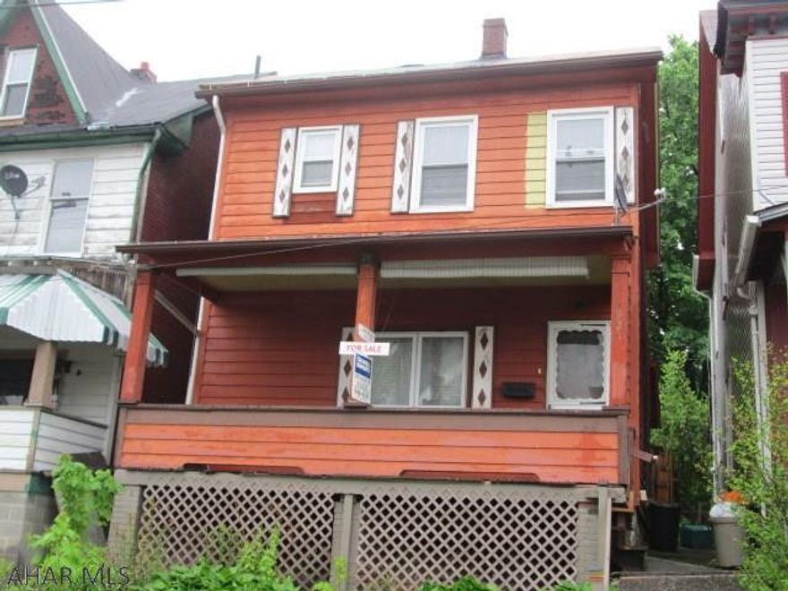 Altoona. A "must see" at this price range. This 2 bedroom features a brand new roof, very nice updated eat in kitchen. The kitchen leads out to a rear 3 season sunroom. The second floor bath is a total transformation with tile floor, designer tile walls and large sink area. All mechanics are good. The rear yard is fenced and has off street parking for 2. It is priced to sell.