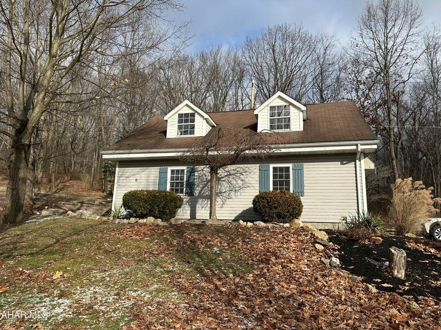 Check out this beautiful setting in Duncansville with over 0.5 acre of land, you are going to love the patio and deck that would be great for entertaining or for a morning of solitude, flexible floor plan with potential for a bedroom on the main floor, full bath on main floor, upper level has vaulted ceilings with two bedrooms, lots of closet space including a large walk-in closet, full bath and laundry, new flooring on the upper level, new retaining wall, freshly painted interior, new lights, central air