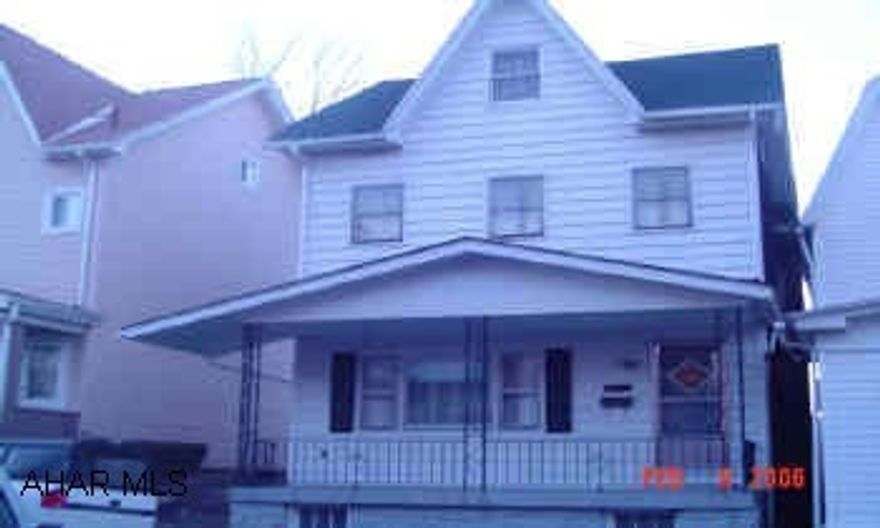 Huge rooms. Possible 4th bedroom in attic (heated) 1st floor den could be used as bedroom. Enclosed back porch, off street parking. Irregular lot. Fireplace in basement.