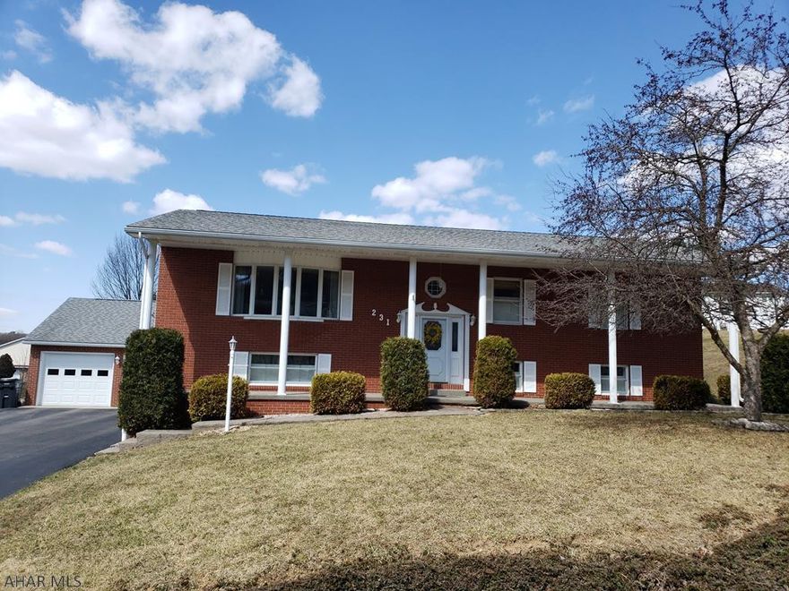 Well maintained home on Bonnie Lane in Hollidaysburg. This home is MUCH larger than it appears. The main level offers a large living room, eat in kitchen with new appliances, dining room, and beautiful 4 seasons room overlooking the in ground salt water pool, master suite and second bedroom. The lower level offers 2 additional bedrooms both with walk in closets, a full bath, laundry room leading to the back patio and pool, and a large family room with full bar and gas fireplace. The storage throughout this home is amazing! The oversized 2 car garage is another added bonus! You must see the inside of this home! Call listing agent for your tour today.