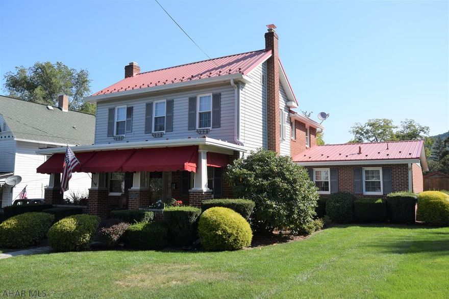 When modern style and convenience meet historic charm and character it's a beautiful thing and this is a beautiful home.  French doors lead to the dining room to the living room.  Open kitchen with center island, beautiful granite counter tops and nice appliances.  Convenient first floor laundry and 3/4 bath.  Beautiful front porch with new awnings.  Rear paver patio with gazebo makes outdoor entertainment enjoyable and relaxing.  Nicely landscaped.  Yard is fenced for child and pet safety.  Three sheds included for storage.  This is a home to be proud of.