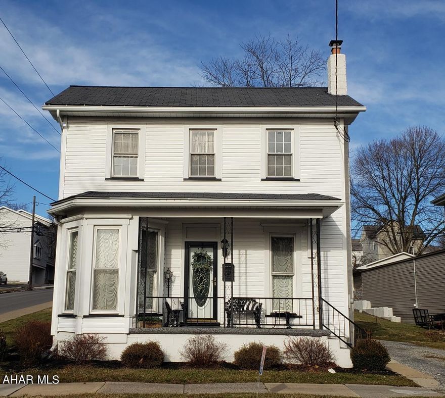 Adorable 3-bedroom vinyl-sided home with modern cherry kitchen, quartz counters, formal dining room, replacement windows, professionally landscaped, corner lot w/off-street parking beside home and from rear alley. J-610