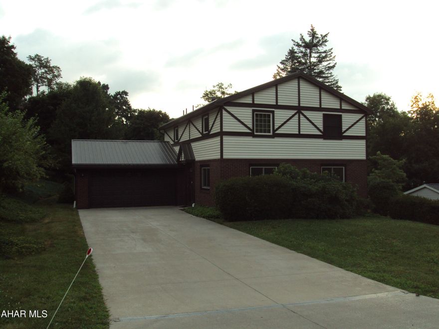 Two story home located in the desirable Highland Park area of Altoona on a dead end street. This home features 4 bedrooms and 2.5 baths. Kitchen with plenty of hickory cabinets & natural light. Attached large 2 car garage with storage above. Newer metal roof, windows, furnace, central air, concrete driveway and more. Flat lot with shed. See list of recent upgrades under documents.