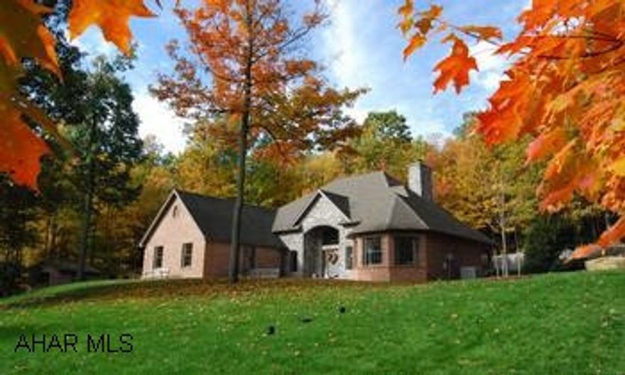 Elegant brick and stone home on a quiet cul-de-sac. Just 12 minutes from downtown Bedford. Elegant brick and stone home on a quiet cul-de-sac. Beautiful outside landscaping, lovely rear stone patio, brick garden shed. Two car attached garage, home has a security system as well as central vacuum, plus multitudes of interior upgrades. First floor has an octagon shaped master bedroom with master bath. Sunken living room with gas fireplace. Two bedrooms and a full bath on 2nd floor. Main level laundry and half bath. Fully finished basement with half bath. Home offers elegance and luxury.