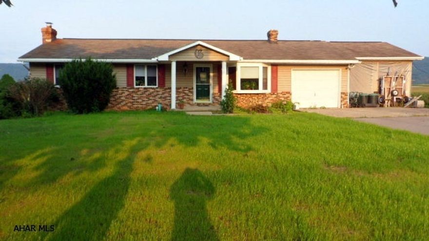 Country living minutes from town, Williamsburg 1.2 acres in Woodbury Twp. 6476 Clover Creek Road. One story with 3 bedrooms, 3 baths, living room, formal dining room, kitchen with breakfast bar, appliances, 1st floor laundry/pantry, semi-finished basement with walk-out, new public sewer, roughed in for 1/2 bath, deck, shed, fenced area, 1-car garage, 1-car carport, private drive...$139,900.