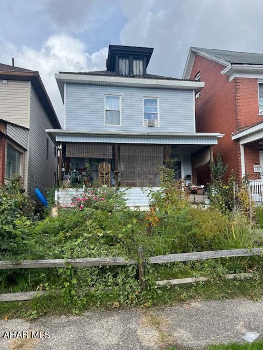 THIS SINGLE FAMILY RENTAL PROPERTY HAS 2 UNITS 1ST AND 2ND FLOOR. THERE IS ALSO AN APARTMENT ABOVE THE GARAGE IN THE REAR. 
PROPERTY IS BEING SOLD AS IS. SELLER WILL MAKE NO REPAIRS.
BUYER TO VERIFY TAXES AND SQUARE FOOTAGE.