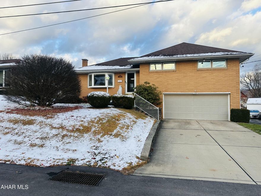 If you've been looking for a beautifully maintained brick split-level home with something to offer the whole family, then this is the house for you!! In addition to the comfortable living space and the large fully fenced yard on a corner lot, you'll find this house has a couple of exciting surprises in store for you too! 

Just inside the front door, the dynamic living space is full of life. Oversized bay windows provide perfect lighting, while the gas fireplace offers welcoming ambience to the living room. Just beyond the living room is a Large, Eat-in kitchen with more cabinet space than you'll need. The built in coffee bar is an added convenience for extra counter space and preparation. Just three steps up beyond the primary living area, there are three generously sized bedrooms, and a full bath. this is where you'll notice your first surprise: Hardwood flooring! It's in every bedroom, and yes, even the living room! 

Stepping down just a few stairs from the living space, is an integral two car garage. This garage is large enough to park two cars, a motorcycle, contain the semi-finished laundry area, a double-door coat closet, and a built in work bench. If the size and utility of the garage isn't enough, this is also where you'll find the second surprise this home holds, A finished second family room! With a built in bar, pool table, and second 3/4 bath, the current owner lovingly refers to it as 'the man cave' It truly is the perfect spot for social gatherings, without interfering with any family members who may have an earlier bed time. 

This house has been loved by the current owner, and is ready to share new experiences with you in your next chapter. Schedule a private tour, and don't miss the opportunity to call 438 Samuel street your new home sweet home!