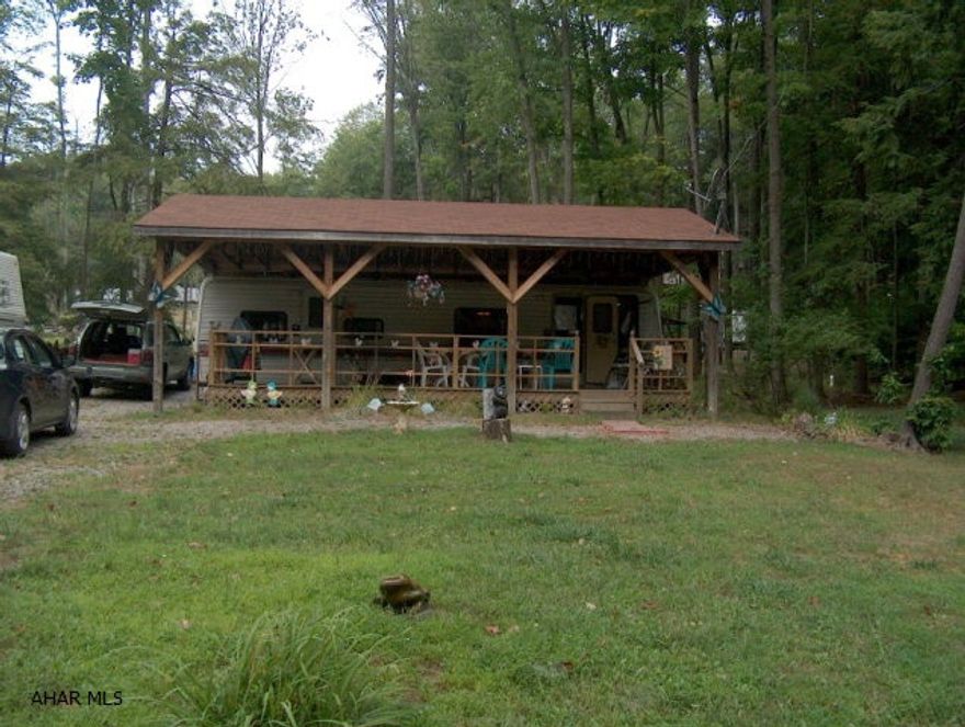 Really nice 36' camper w/pavilion and covered deck, shed & picnic area. Priced to sell!