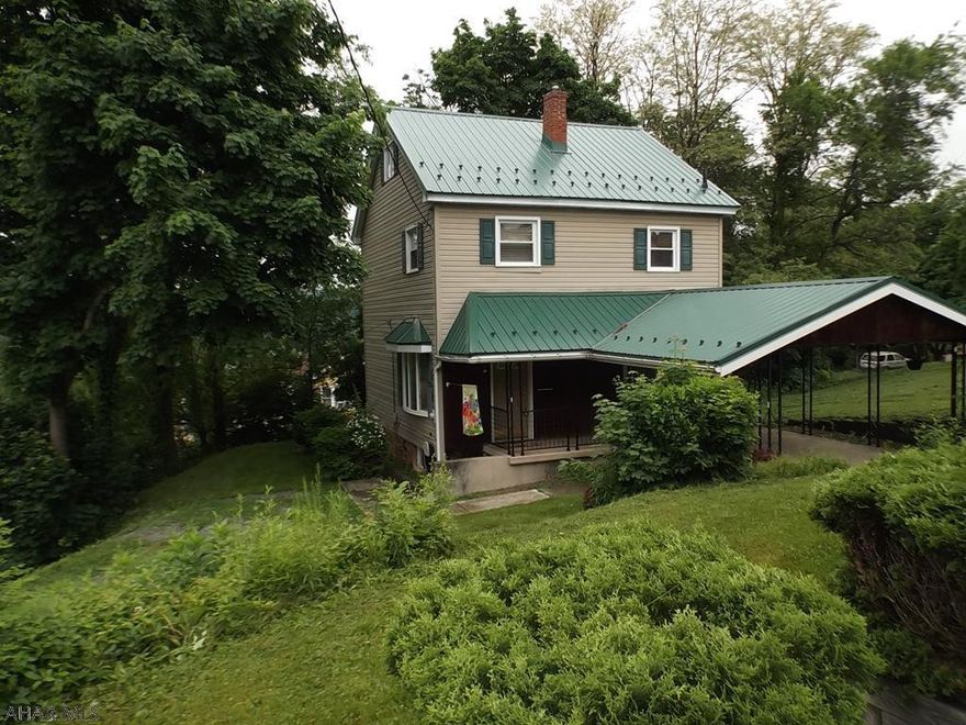Amazing view in a great neighborhood close to Highland Park.  Beautiful oak kitchen with sliders to a covered patio. Meticulously kept home that is move in ready with freshly painted walls & ceilings. The oversized closet in bath allows for stacked washer/dryer-no need to run to basement. Seller replaced roof in 2017, recently added new front steps. This property includes 2 additional lots 25x120, and a 2 car detached garage. Please schedule appt to see this home at a great price!