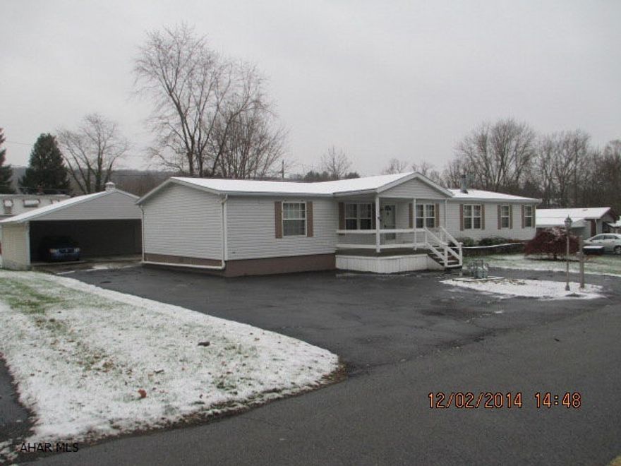 Immaculate condition 28 x 72 double wide on foundation.  Title Retired. Has central air, central vac. on nice size 100 x 120 level lot. Located in Lakemont near golf course. Extra large master bedroom with maste bath and garden tub,separate shower in master bath. Cathedral ceilings. Gas Fireplace in Living Room. Nice open floor plan. 19' x 14' Sunroom has heat if you want to use in the winter. First Floor Laundry. Large 2 car carport with shed area.  Some furniture will be for sale. Could be handicap accessible (needs ramp).  Regular bathroom has a bathfitter shower.