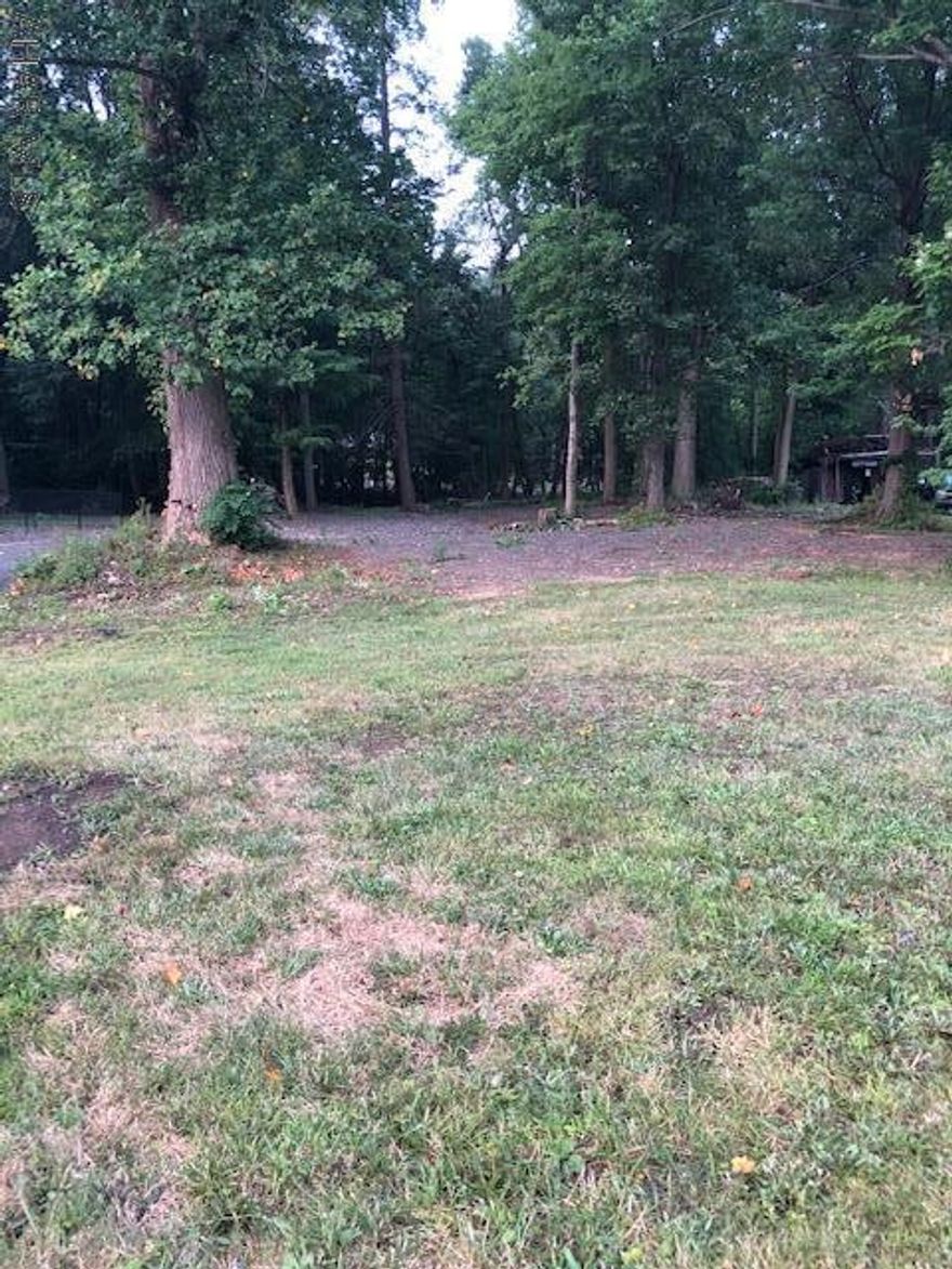 Fantastic building lot on .63 of an acre.  Semi-wooded with stream to the very rear of the lot.  City water, sewer at site.  Natural gas hook ups also at street.
