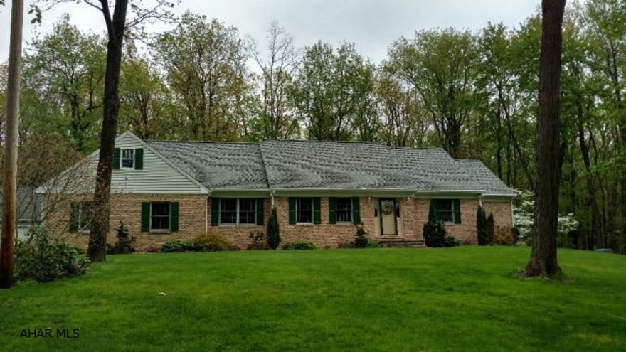 MOTIVATED SELLER! Spring Cove School District, custom McGraw built home. This home has 3 bedrooms with possible 4th bedroom, 2 full baths and a half bath. The property is located on 7.22 secluded acres and features 6 garage stalls with storage above each garage! The home also has a radon mitigation system installed, whole house fan, wired for generator hook up, 4 zone heating system, heat pump and wood burner. Enjoy the view of the woods from the 3 seasons room which features heated tile floors. This home is well maintained and move in ready! Take a look at the 3D tour of this property. https://my.matterport.com/show/?m=Vd8byRgDGhd  Call listing agent today!